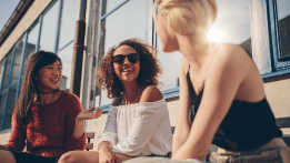 Friends discussing banking offers